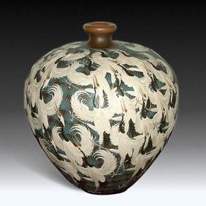 简述宜兴陶瓷装饰工艺的发展历史 