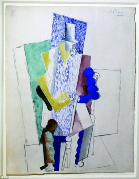 毕加索画作《戴折叠式大礼帽的男子》。