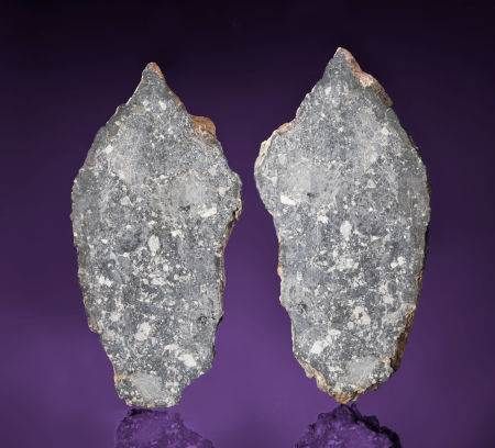 这块编号为Dar al Gani 1058的月球岩石样品即将进行拍卖，预计其售价将达34万~38万美元
